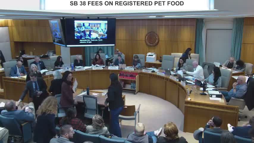 Heated hearing on gun dealer rules and future ban on certain semiautomatic weapons; sponsors roll SB17 for further work