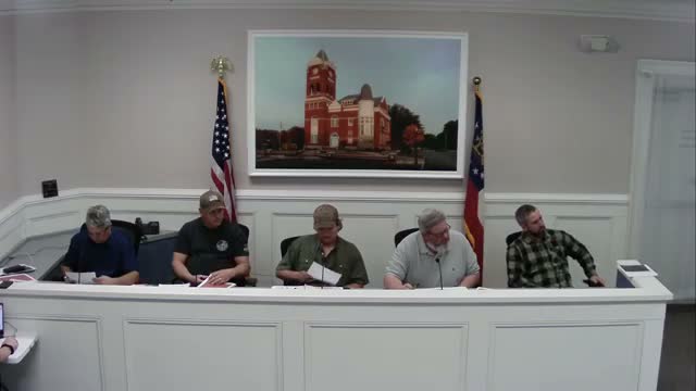Haralson County meeting tables rezoning request amid questions over parcel splits and code provision