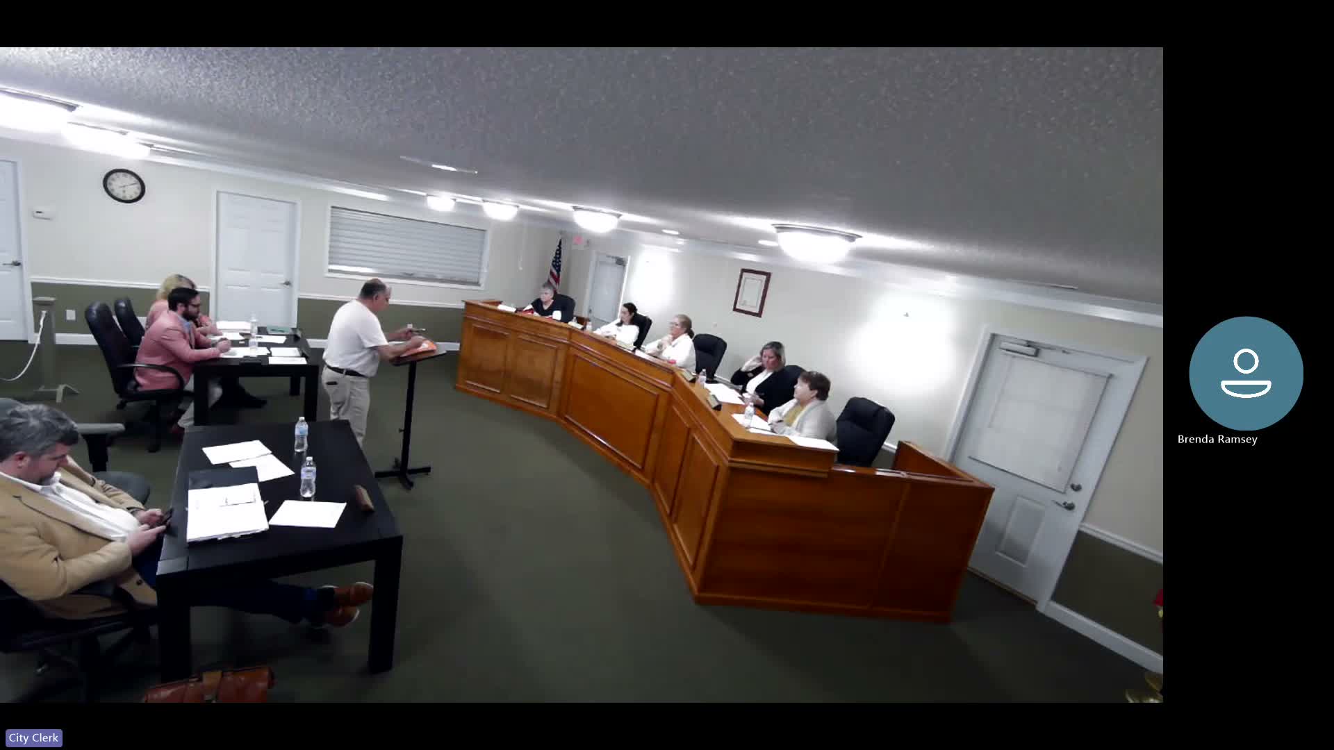 Local business owner tells council of repeated inspections, unannounced property entries and citation disputes