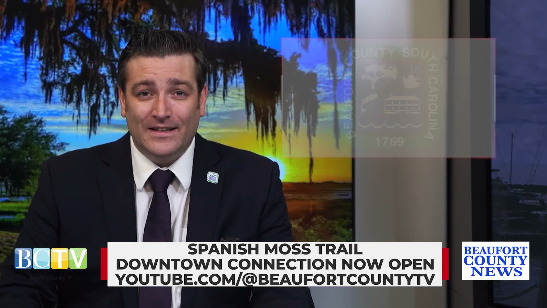 Ribbon cutting on Spanish Moss Trail: students install Little Free Library