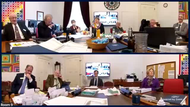 Committee reports passage of budget adjustment; small reallocations for meals and housing language updated