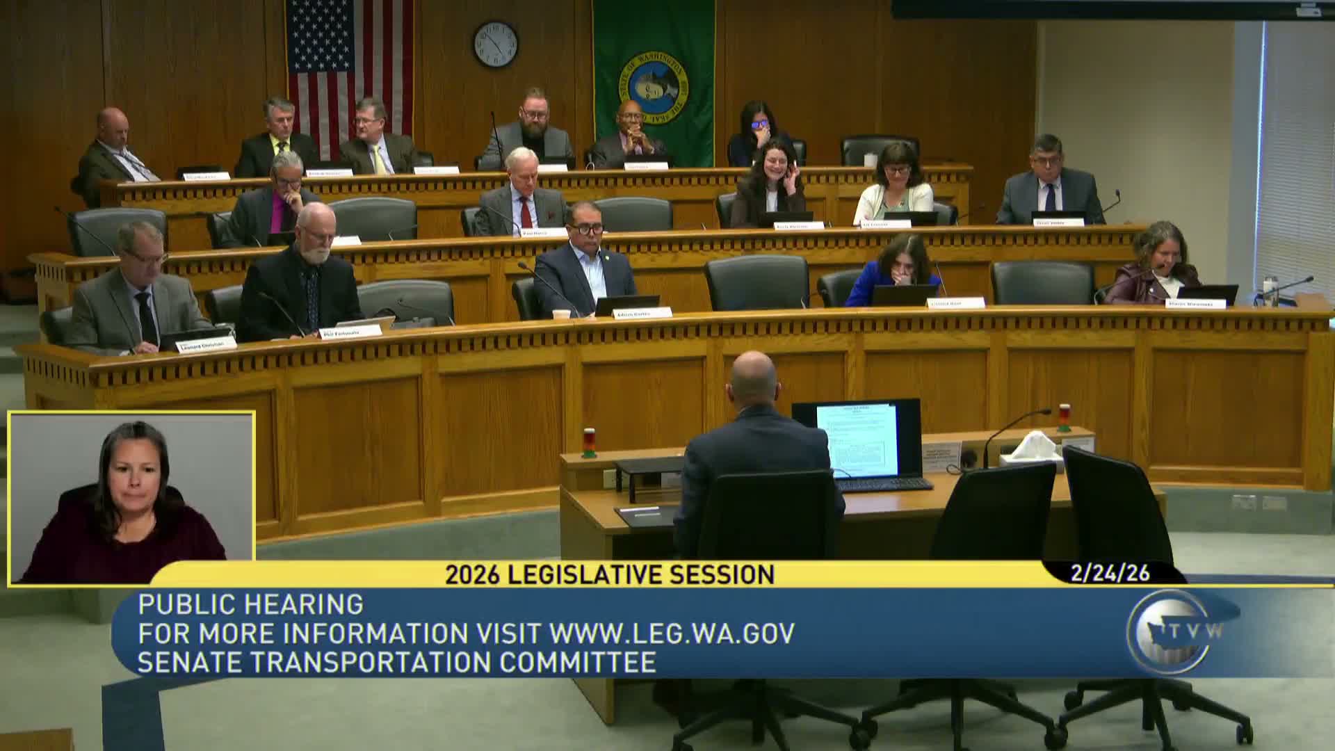 Committee hears split testimony on bill allowing limited EV direct sales and raising documentary fee
