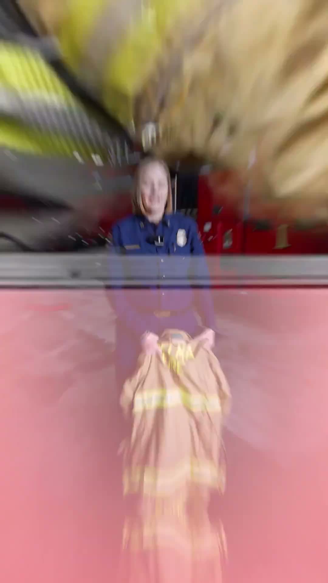 Battalion Chief Ashley Greco shows 13 new turnout coats bought in 2025