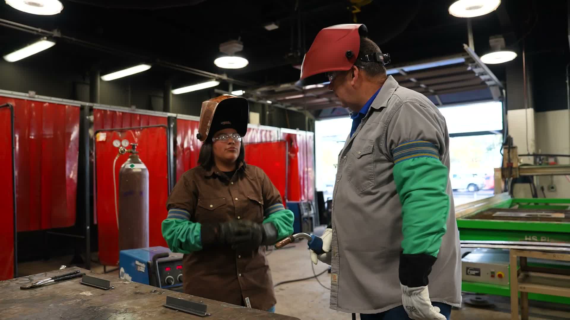School board member Paul Gilmore visits Carrollton-Farmers Branch ISD welding shop, highlights new certificate option