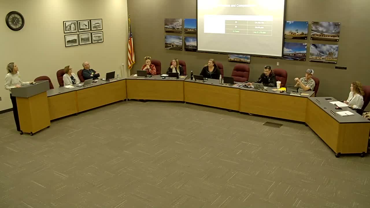 Superintendent says district cut 12 central-office positions and reduced compensation by about $1.3 million
