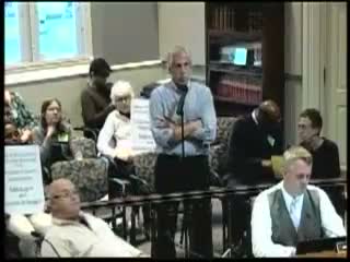 Expanded budget committee approves a series of staff and program amendments; debates jail staffing and body‑camera funding