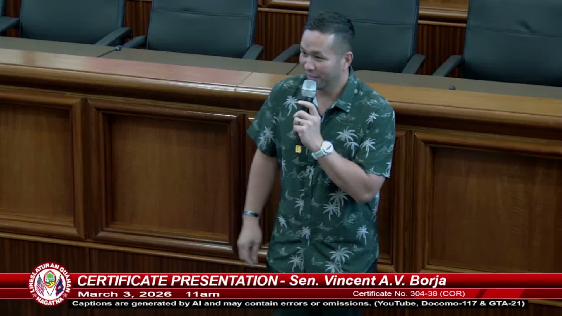 Sen. Vince Borja presents certificate recognizing University of Guam during Charter Day kickoff