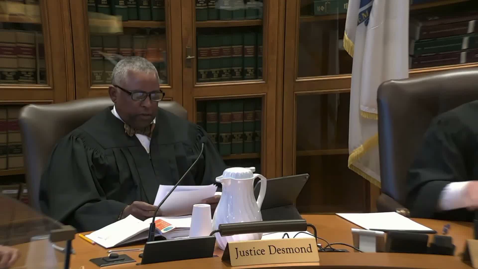 Appeals court weighs whether manager's search of backpack created state action in Carvajal Morales suppression fight