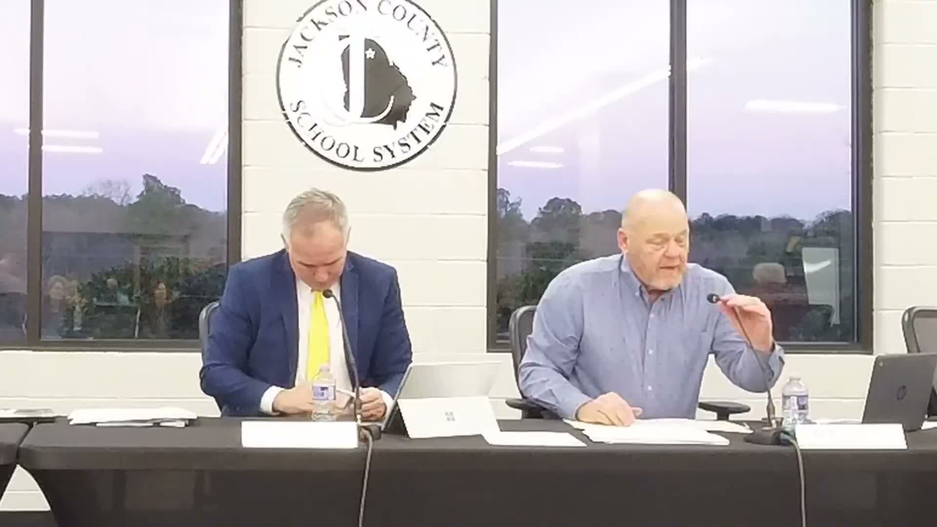 Board approves 2026–27 contract renewals after executive session; one abstention recorded