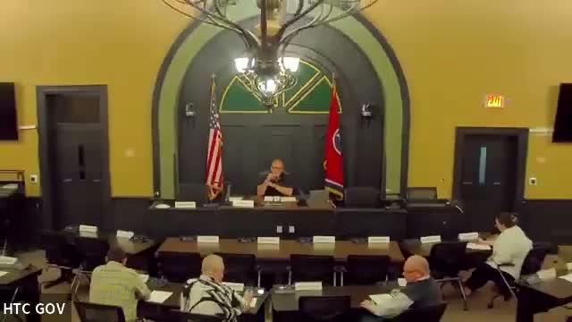 Committee approves county highway department to pave walk track after receiving cheaper estimate