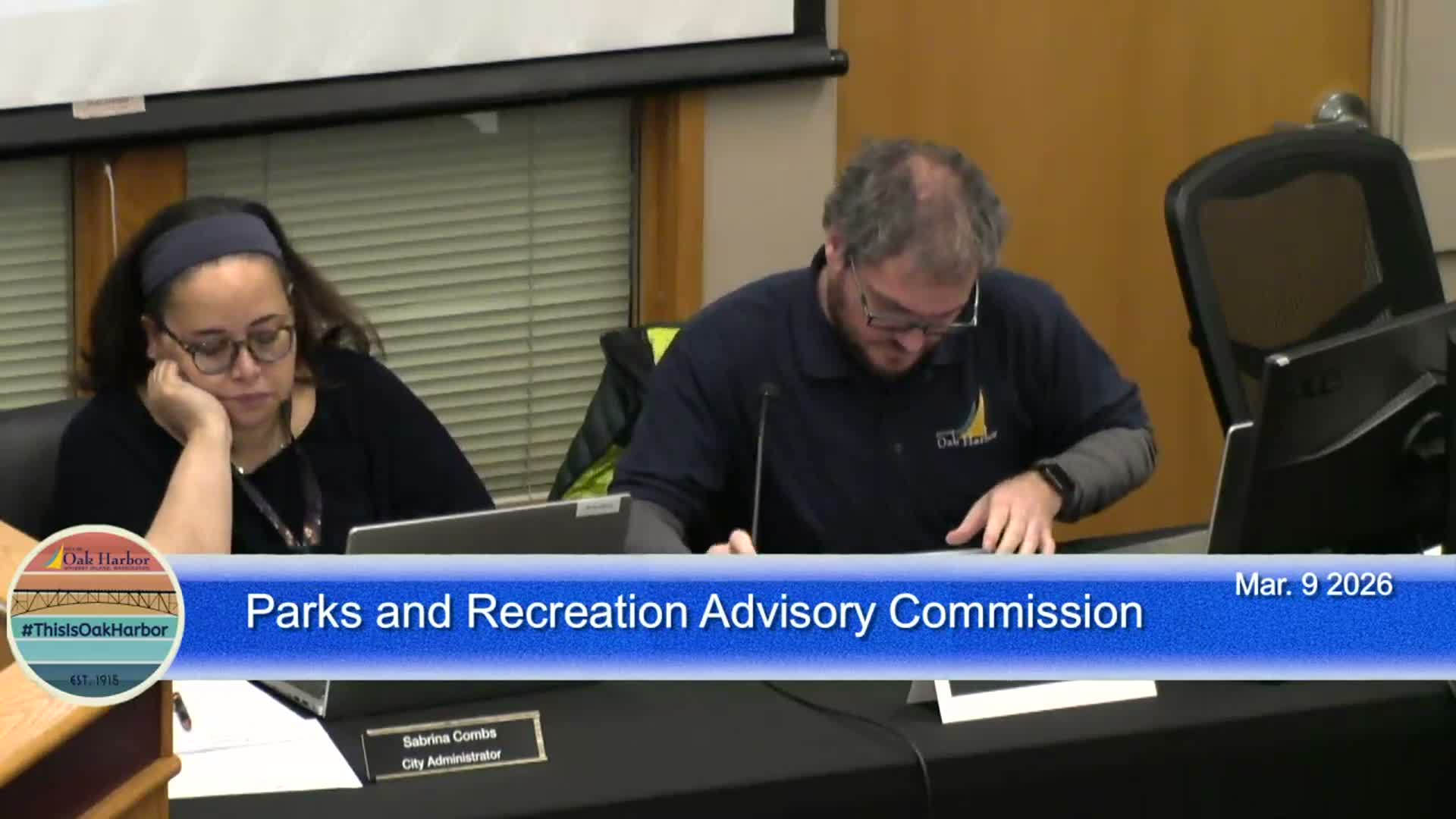 Commissioner shows photos of trail overgrowth and encampments; staff to brief public works on cleanup options