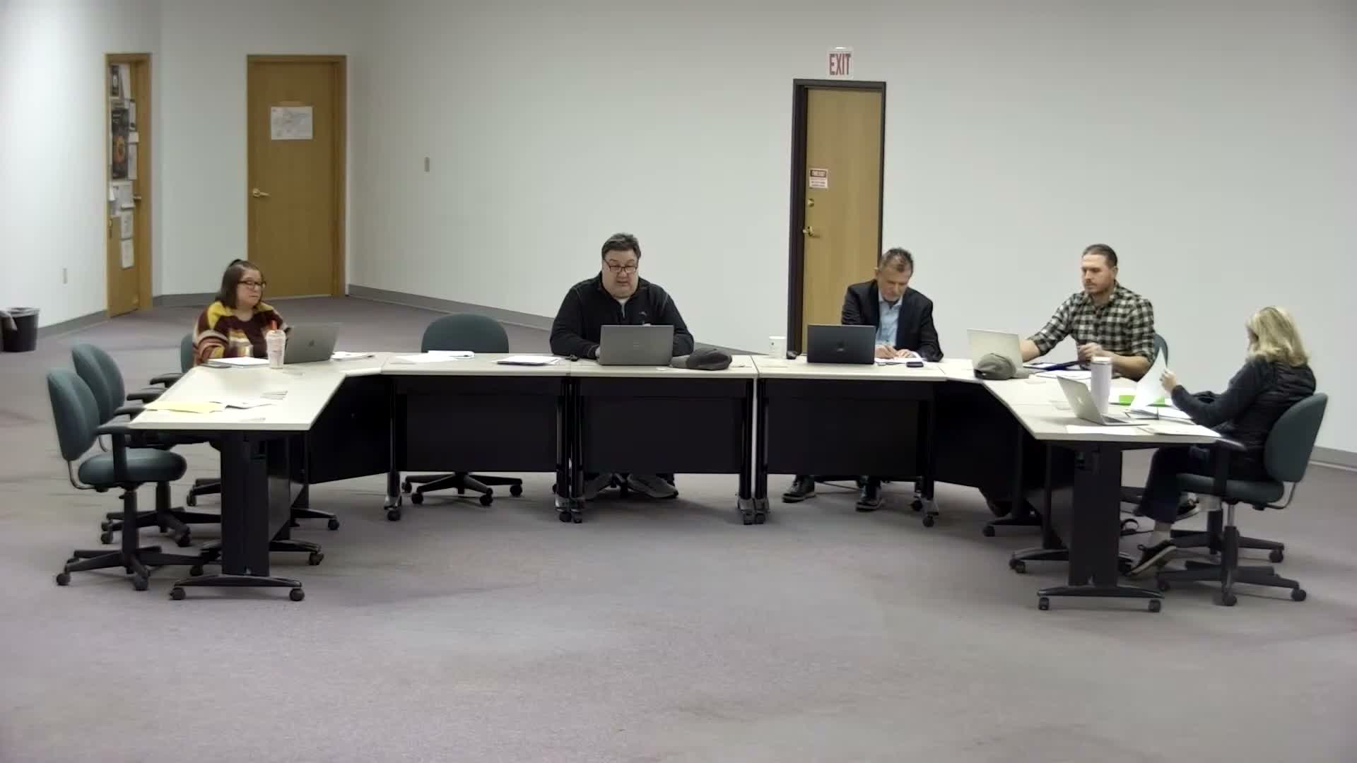 Board approves packages of work agreements and a two‑year contract for Willie Speltz after budgeted debate