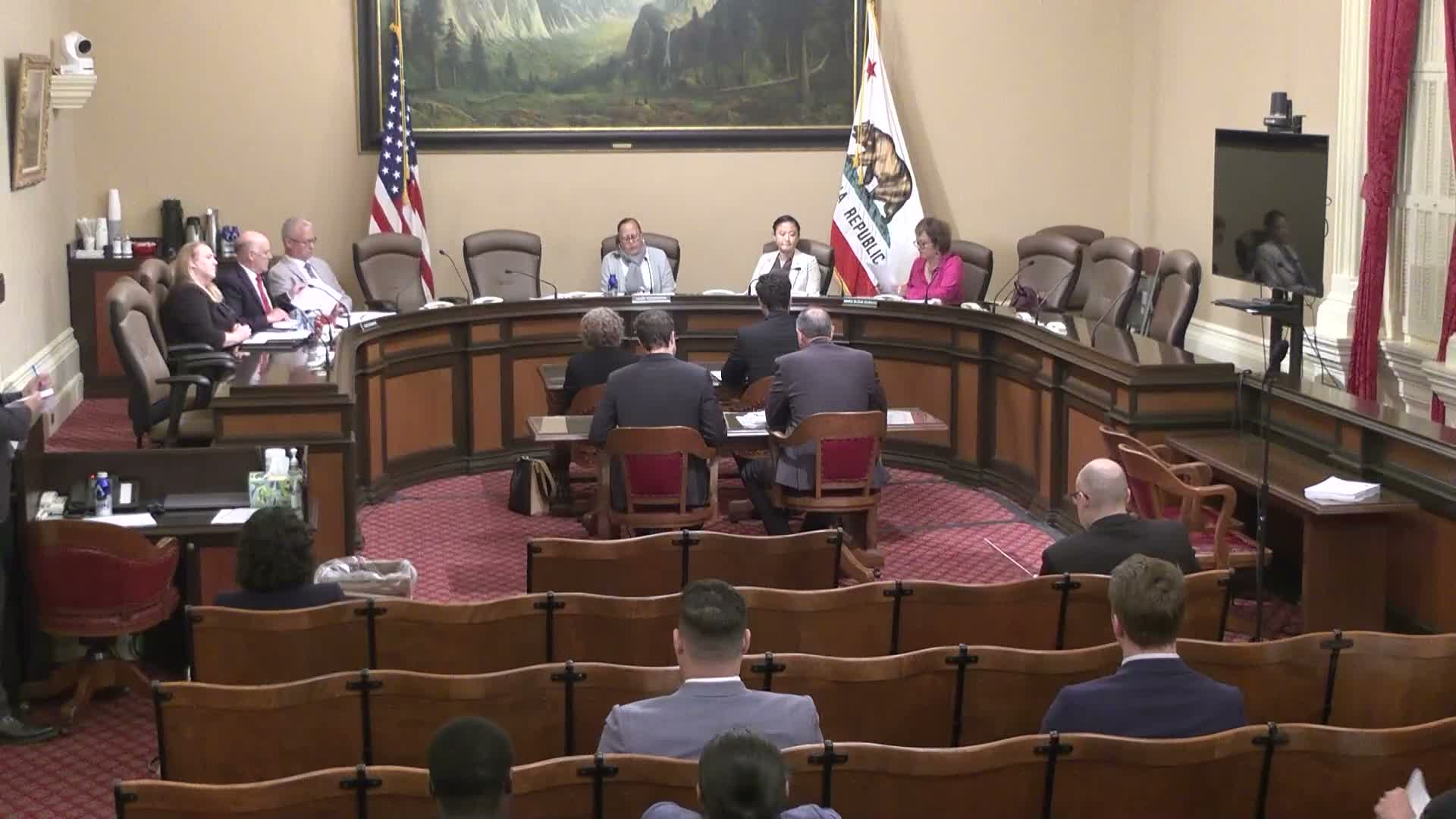 Caltrans proposes swapping $50M federal allocation for $30M state funding for high‑road training; author and members question the cut and delay