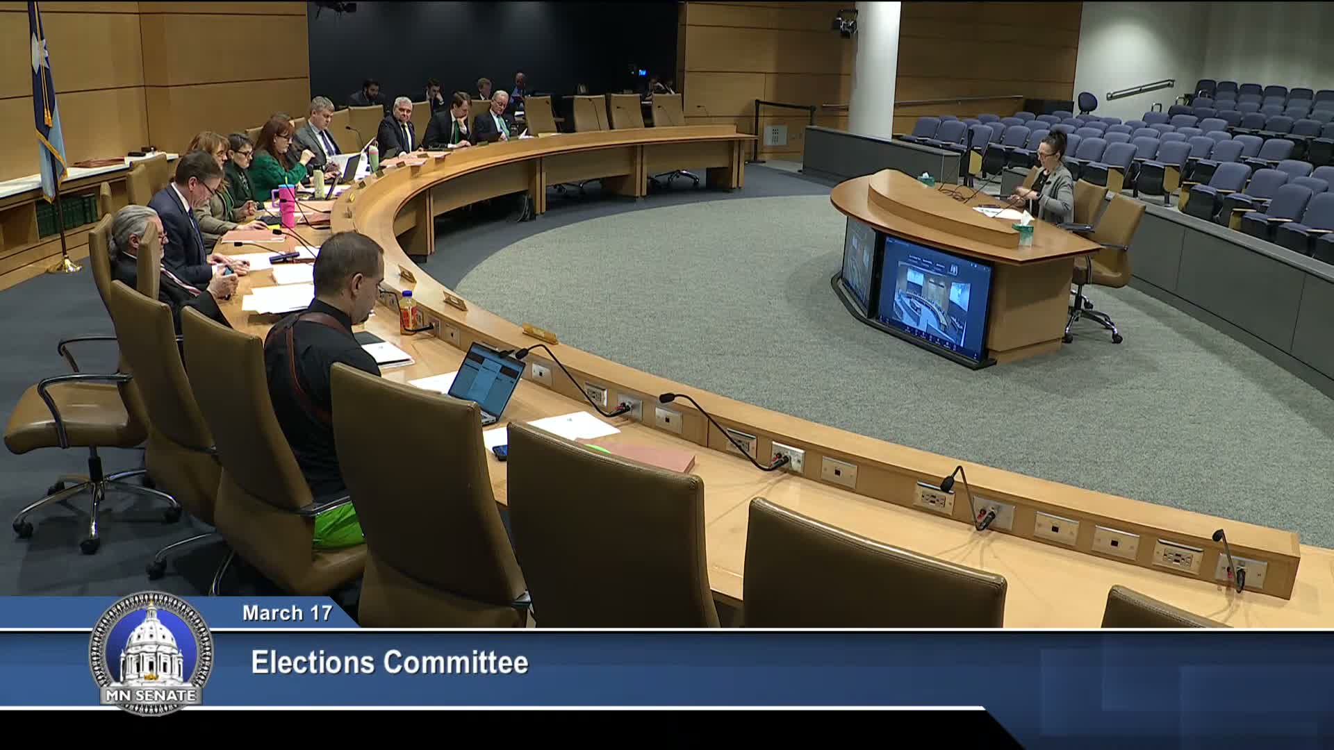 Committee adopts amendment for working group to study local campaign‑finance reporting; amendment passes 11–0