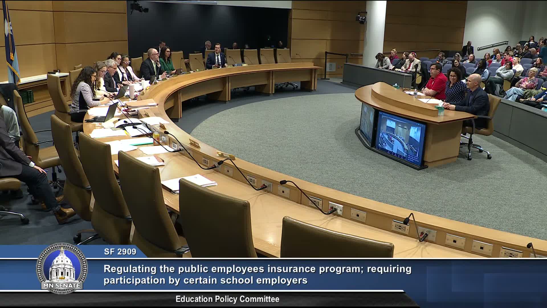 Panel advances bill to create statewide educator health-insurance pool after hours of testimony