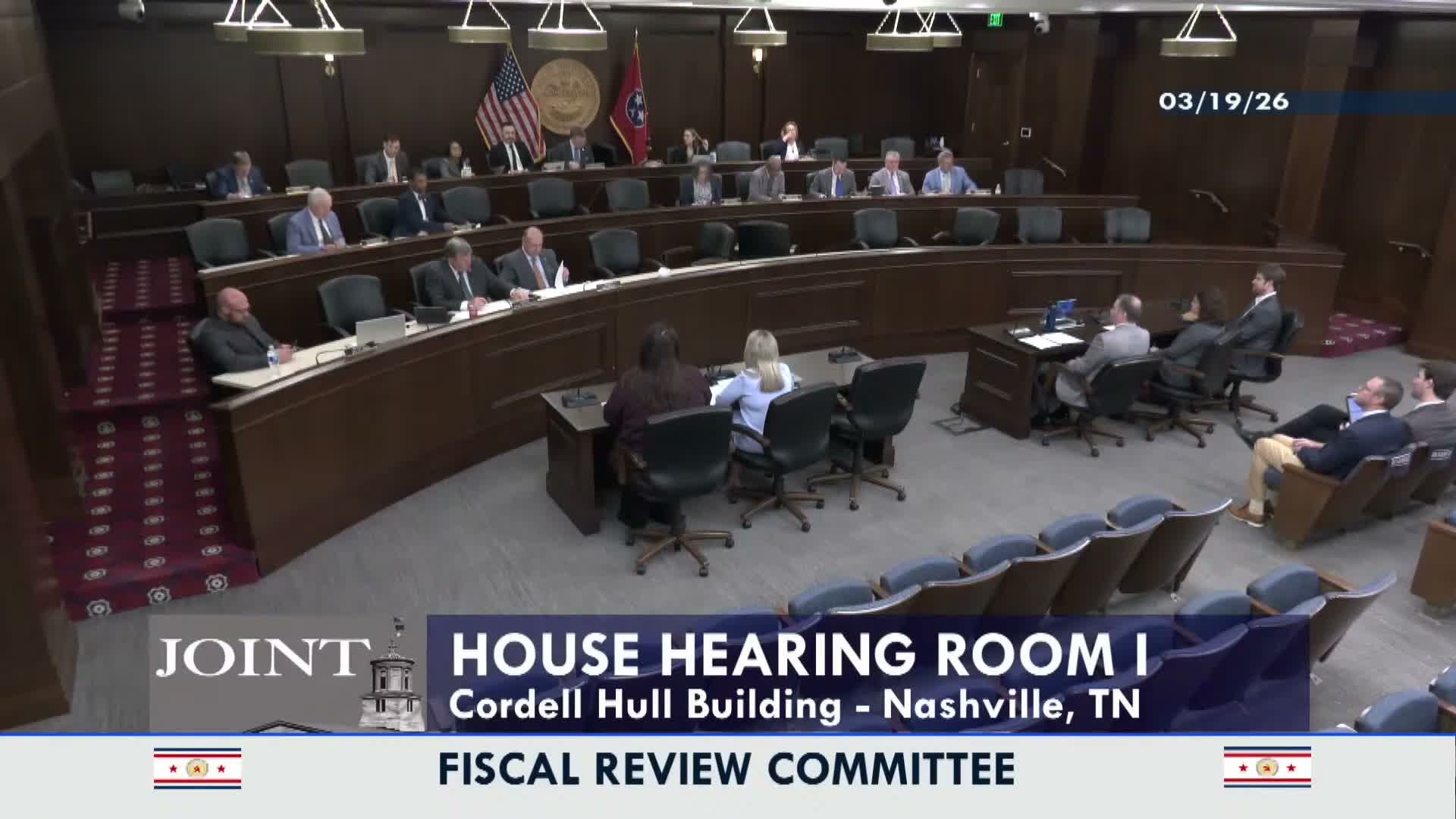 Representative questions TDOC sole‑source satellite contract; committee approves consolidation with Buford