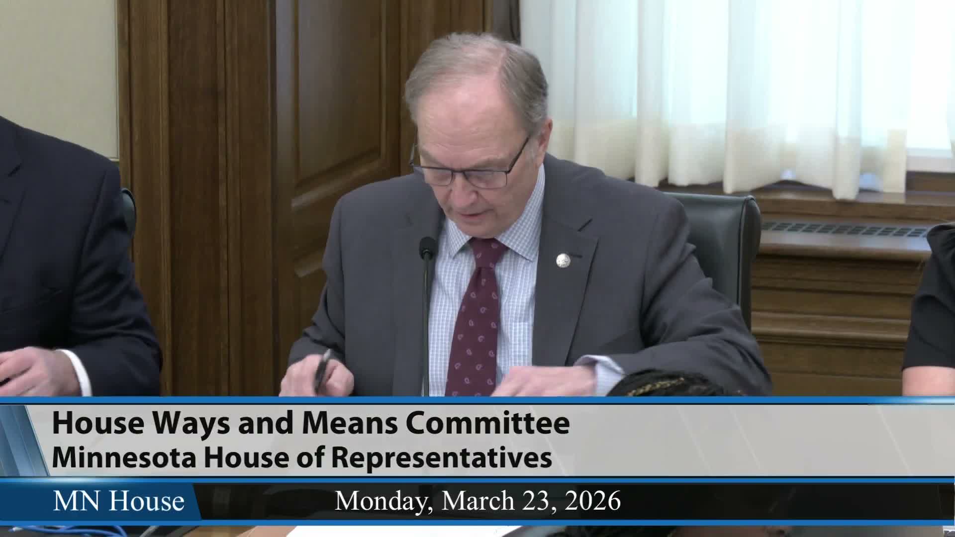 Committee advances several technical and licensing bills; credit‑union measure returned to Commerce