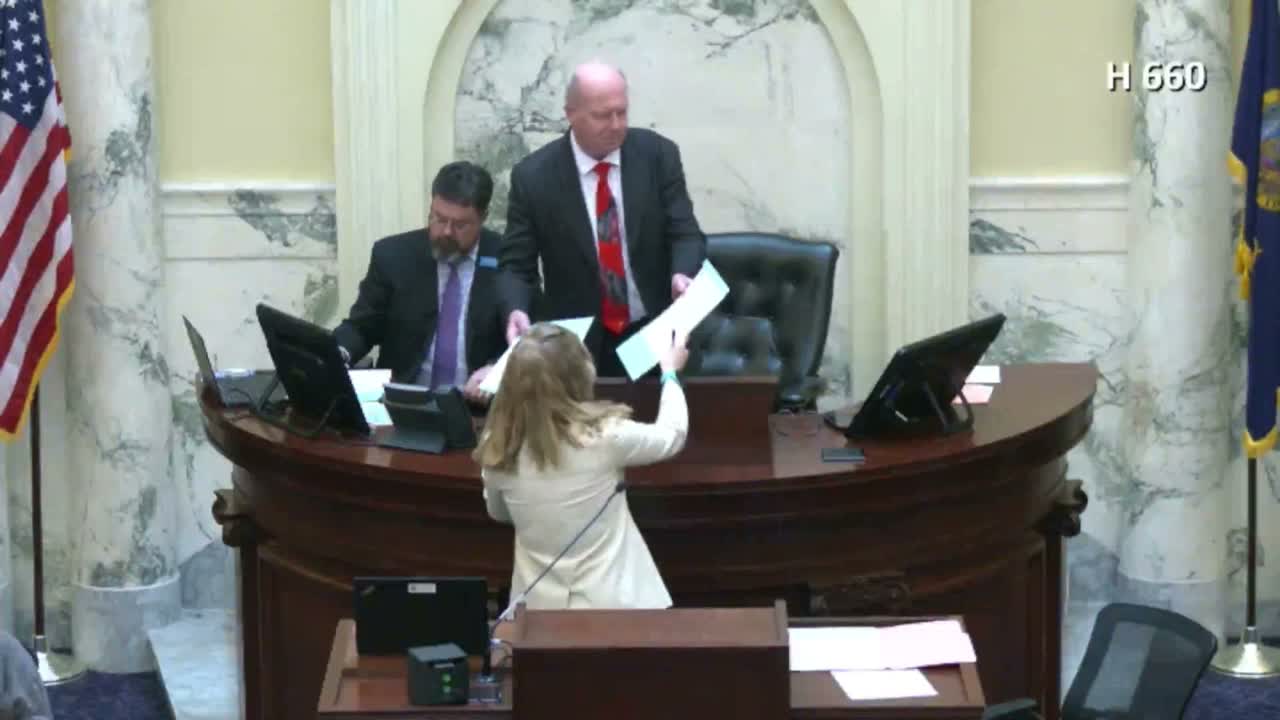 Sponsor seeks twice‑yearly reporting of immigration status for booked arrestees; members raise access and enforcement concerns