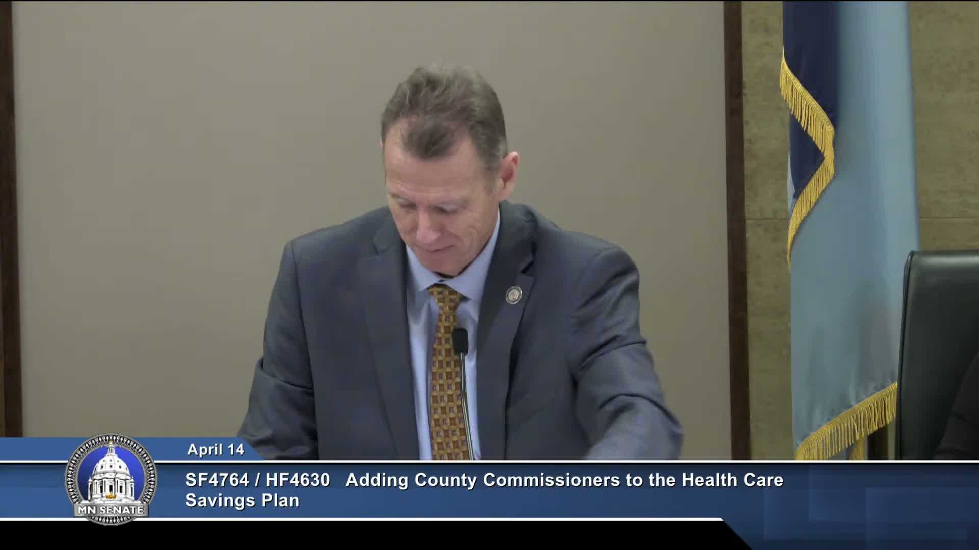 Commission backs letting county commissioners join state health‑care savings plan