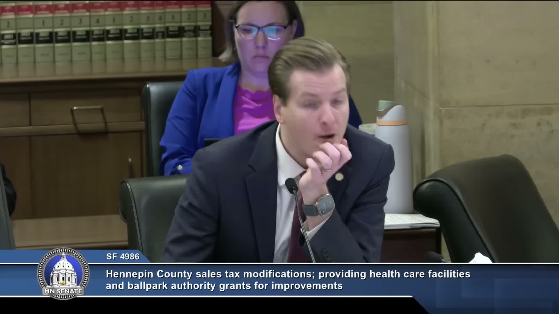 Committee hears bill to raise and repurpose Hennepin County sales tax for Hennepin Healthcare; amendment adopted and bill laid over