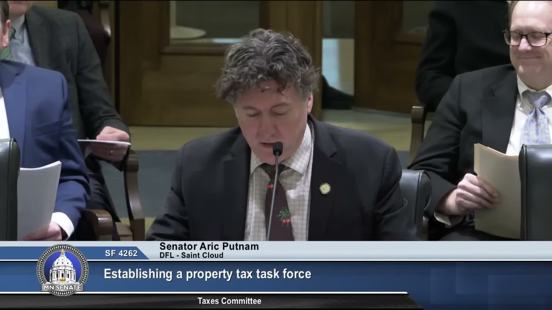 Sen. Putnam wins committee adoption of task force to study property‑tax relief; bill sent to finance