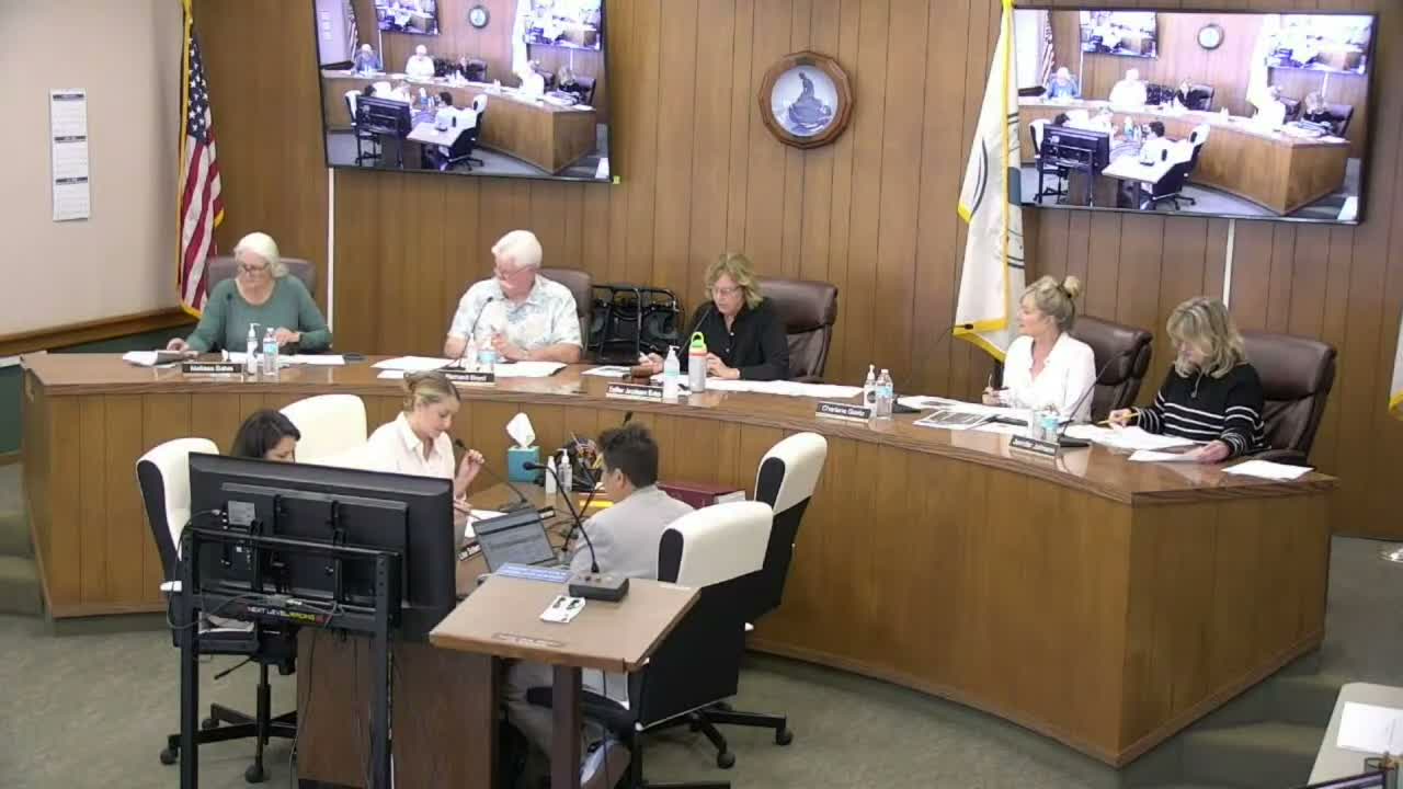 Planning staff briefs Design Review Committee on 88‑unit pre-application, construction resumptions and a stop‑work lawsuit