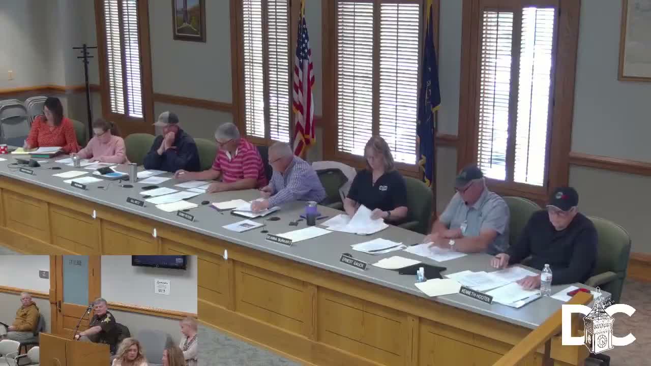 Prosecutor asks commissioners to create part‑time victim services director; board approves using attorney funding