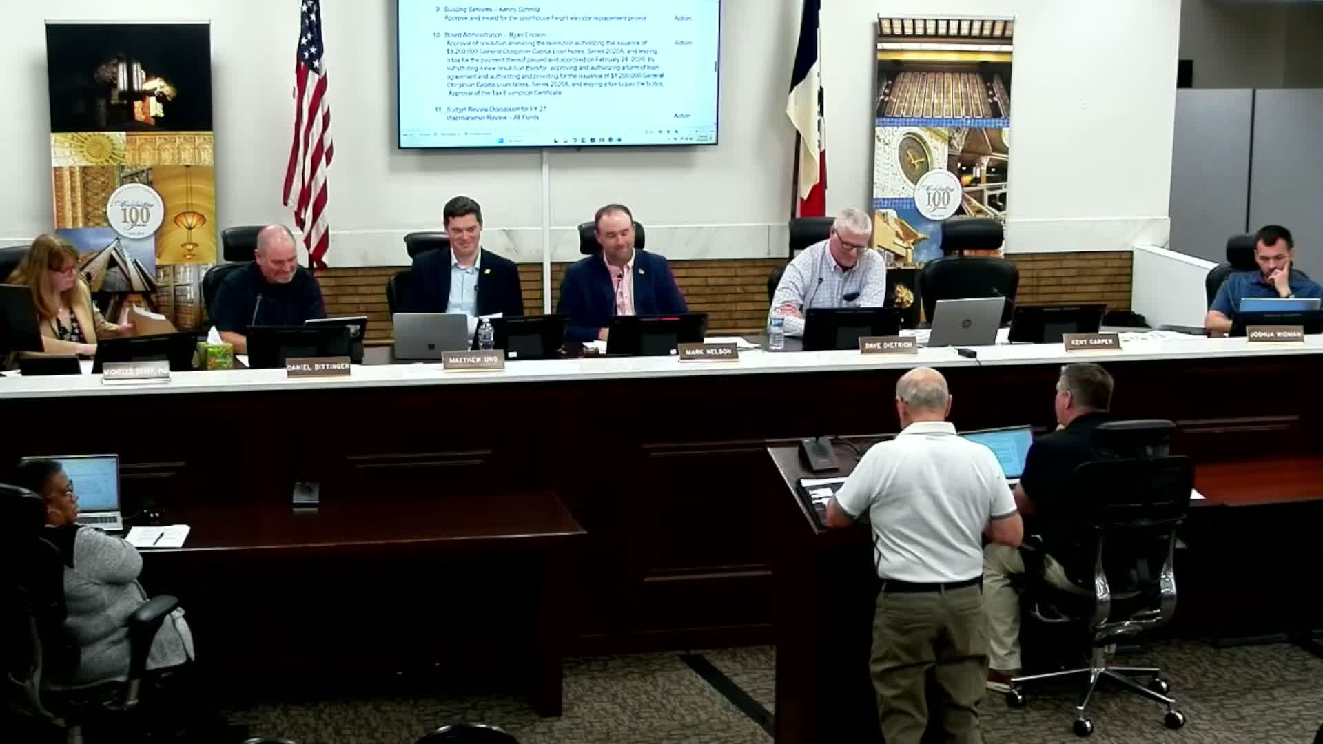 County picks low bidder for courthouse freight‑elevator replacement after bids top estimates; officials warn of election‑time risks