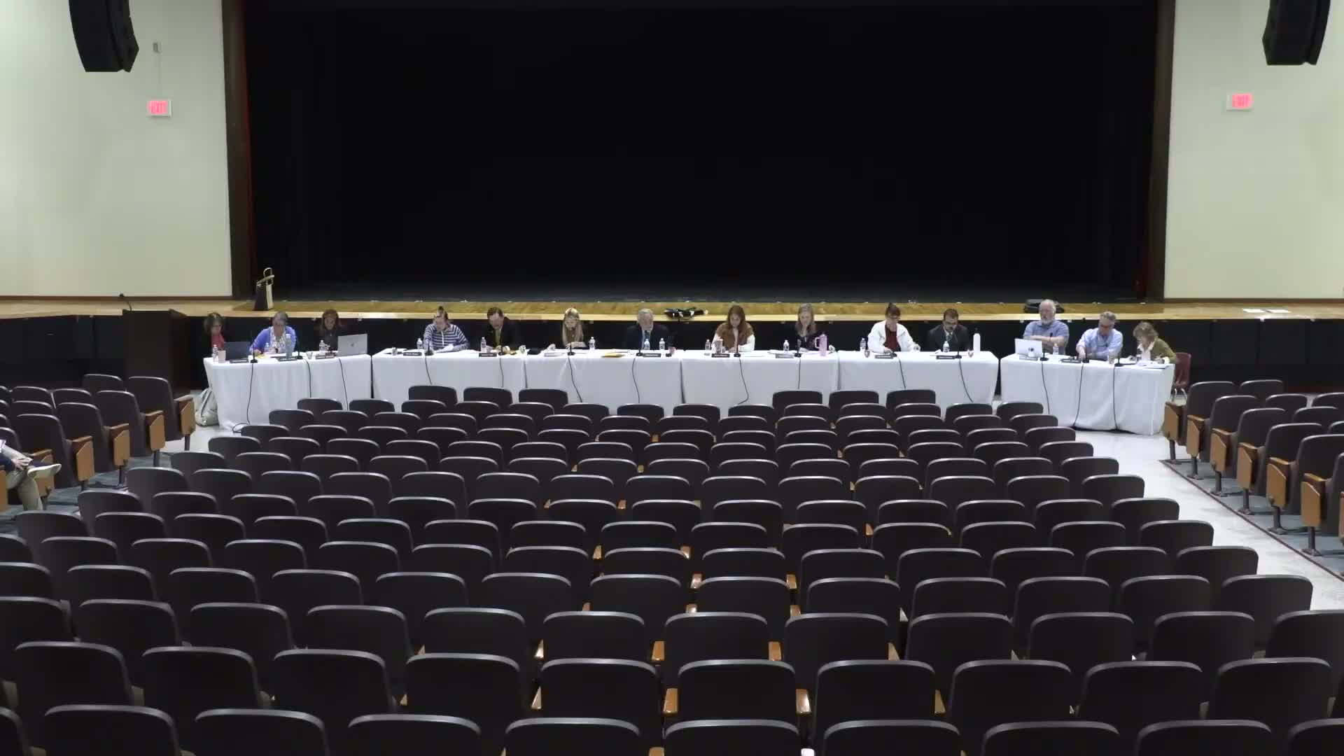 Board approves $25,000 extension to Colliers contract for high‑school planning, grants superintendent transfer authority