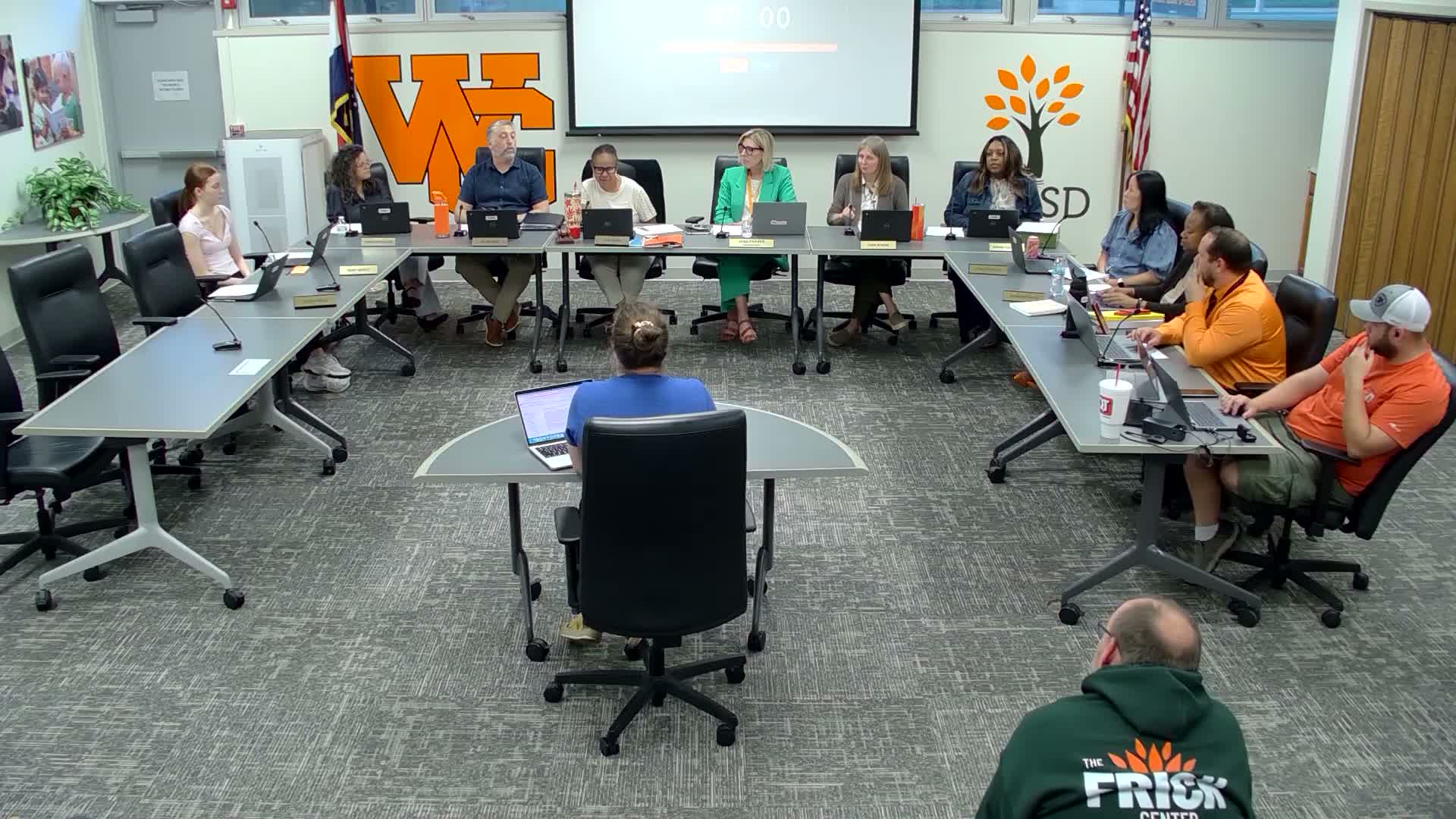 Teacher and union leader urges trust in teachers during public comment