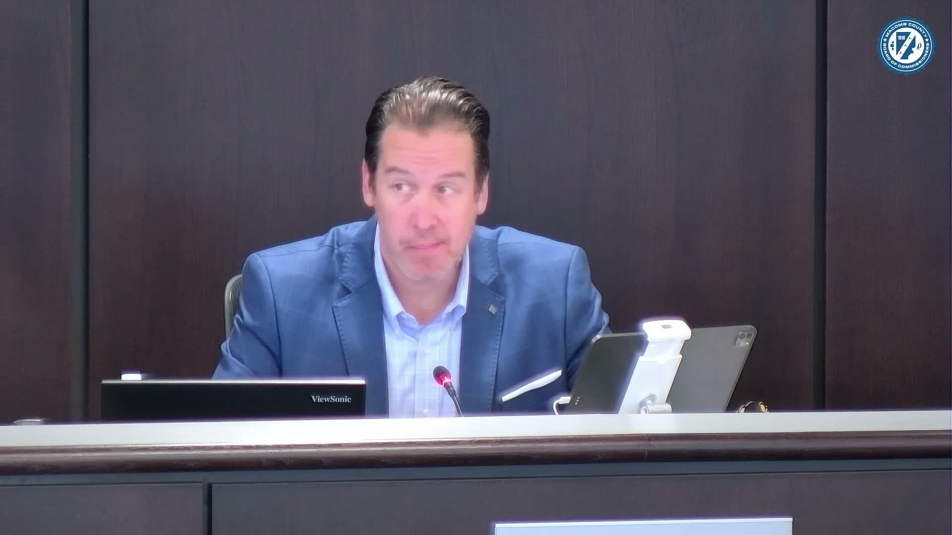 Macomb County refers carpet replacement back to committee, rejects salt‑barn task order and approves paving contract