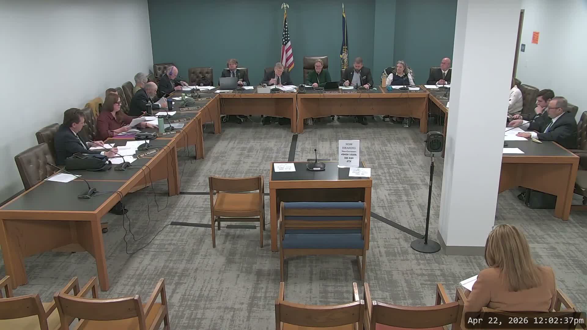 Committee opts for interim study on bill to let salons and barbers sell one drink after lively debate