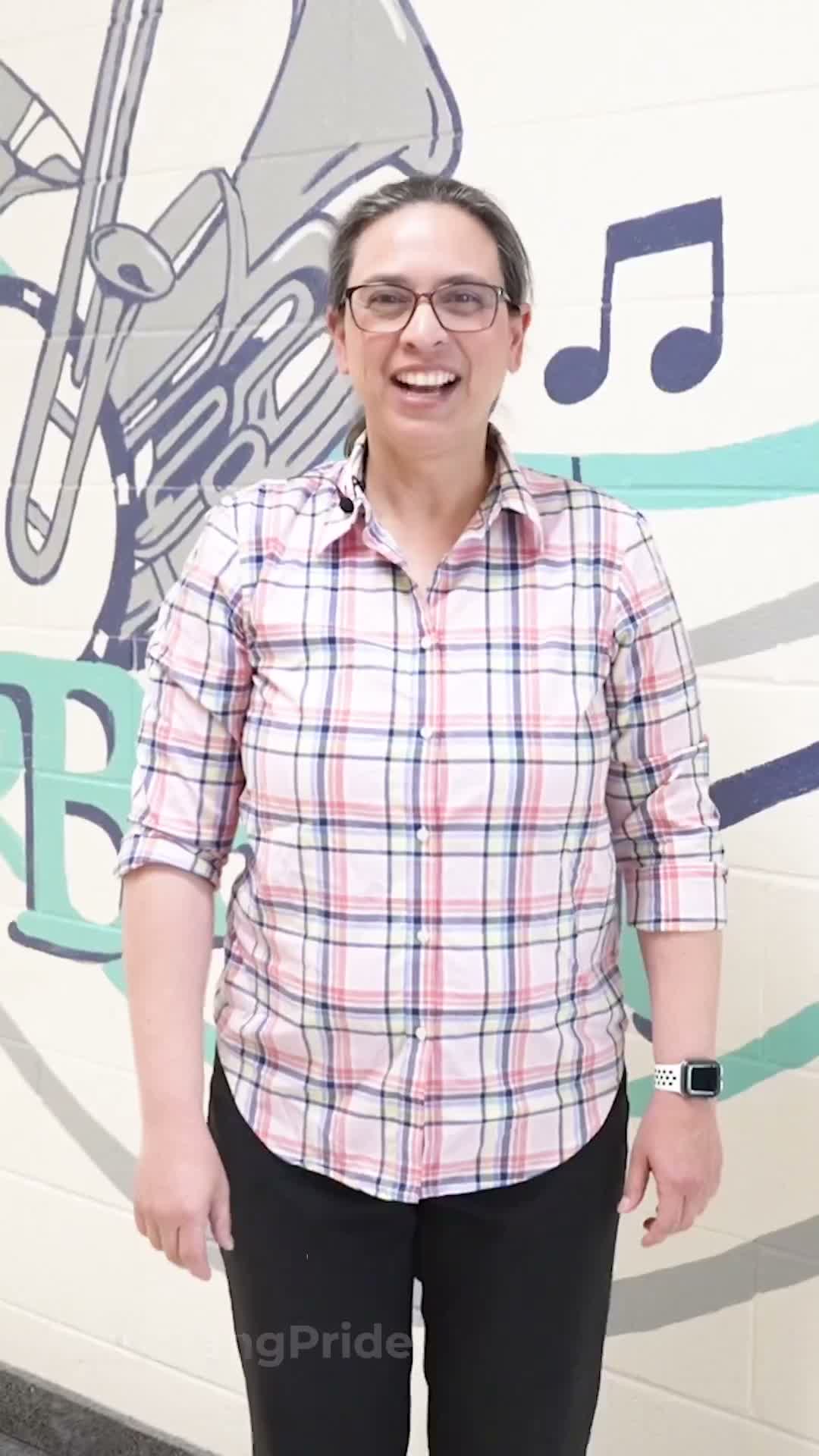 Michelle Ortiz, Mueller Road band director, praises students’ progress