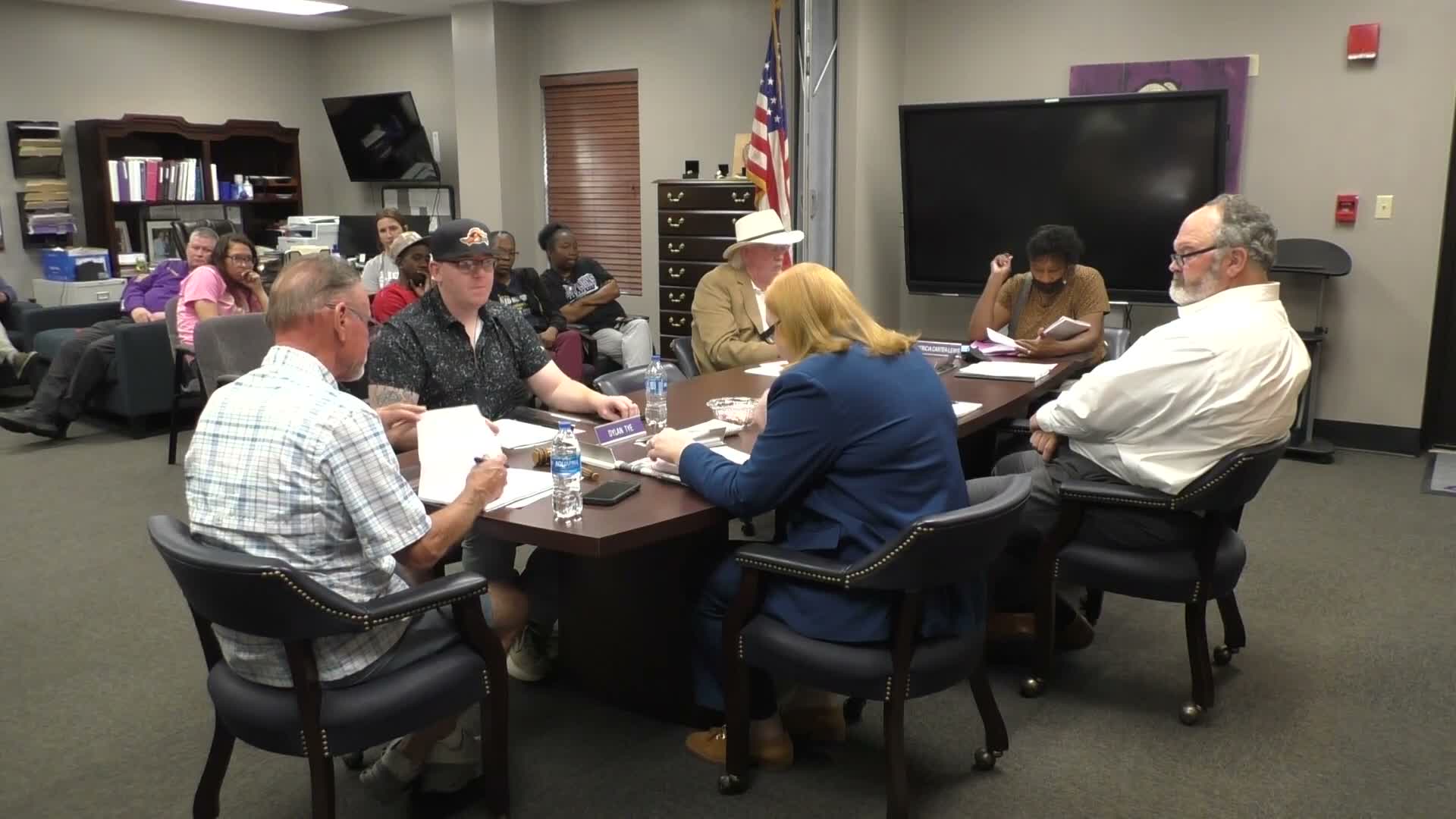 England district hires coach, nurses and custodial staff; board accepts several resignations