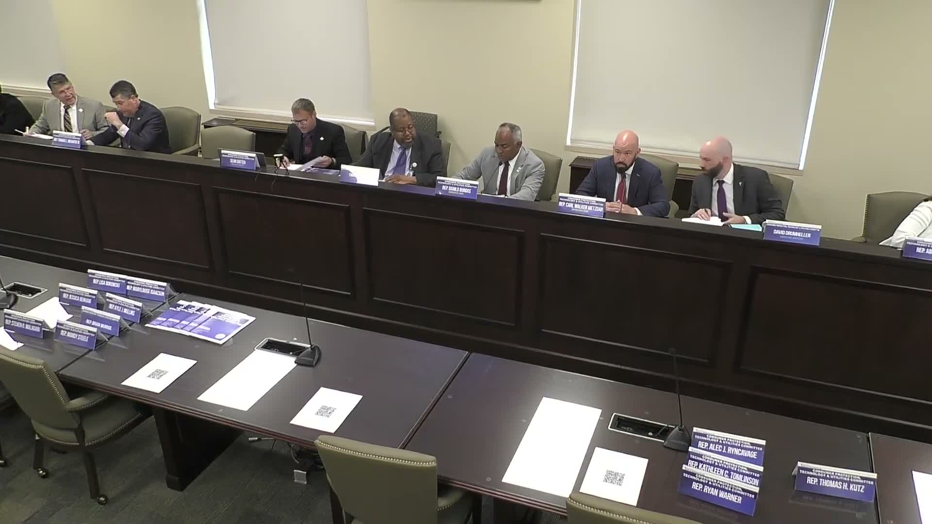 Committee approves utility-record exception, anti‑robocall measure and three resolutions