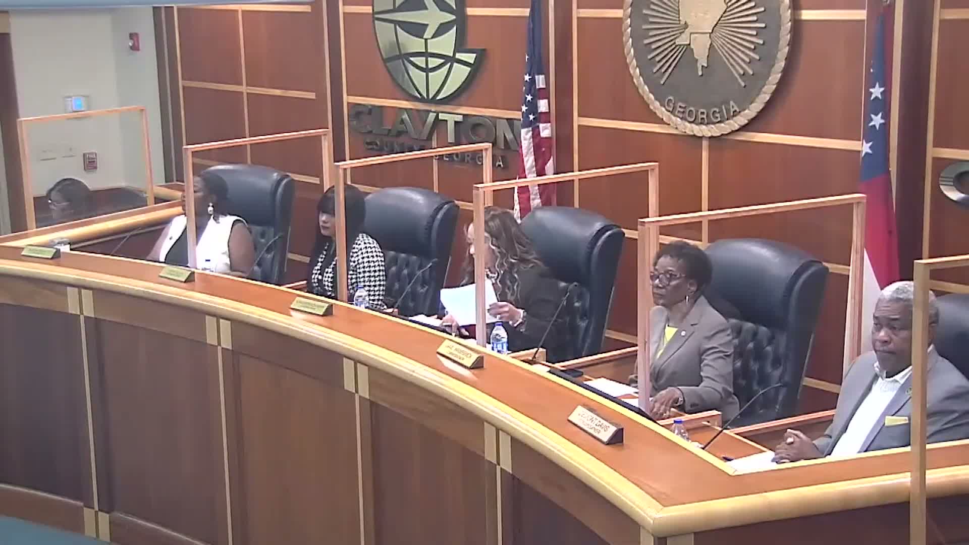 Commissioners reject sole‑source award for court monitoring devices, opt to table contract