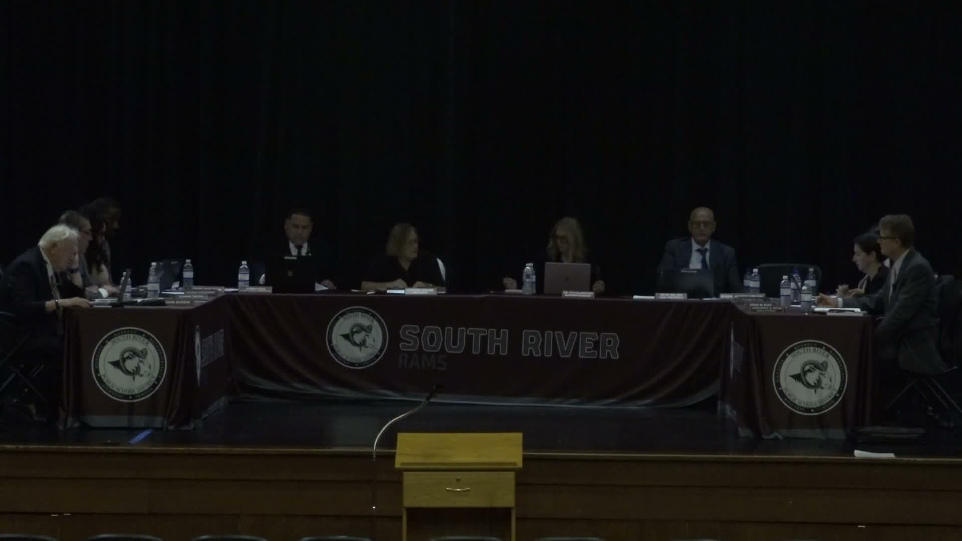 Board approves consent resolution and routine business, then enters closed session