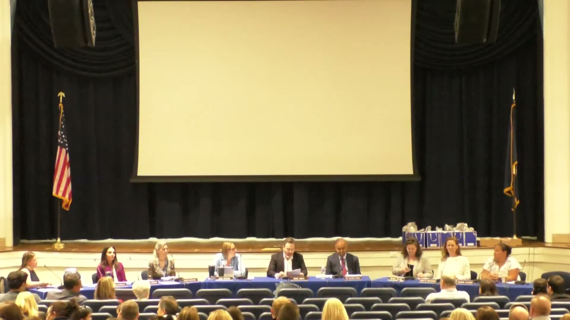 Port Washington schools honor 10‑year tenure recipients and retirees; board formally awards tenure