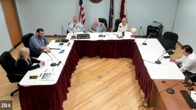 Troy board debates front-yard ADU at Christie Street; residency proof and enforceability concerns sink variance