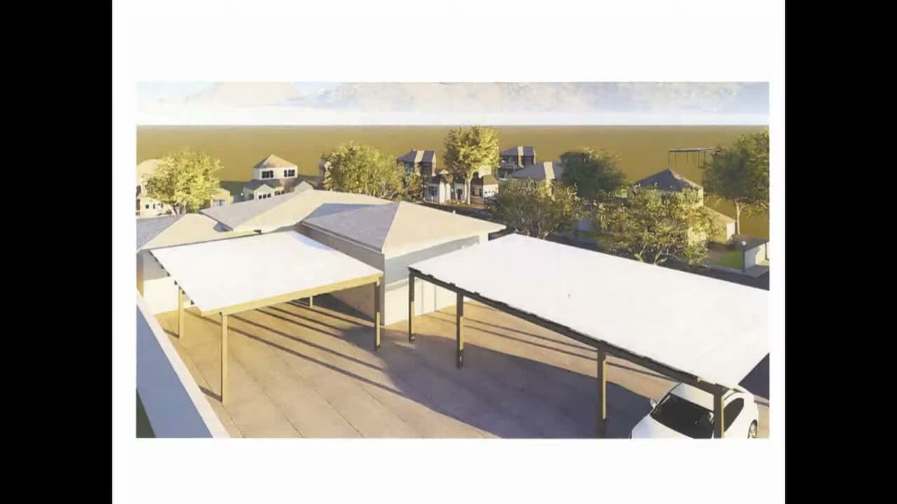 Staff recommends 50% living ground cover for 805 Austin Drive parkway; commission moves item to end to contact owner