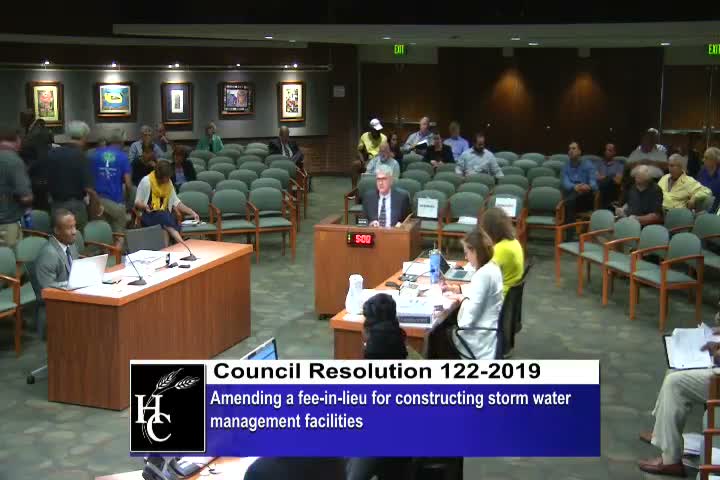 County staff recommends higher stormwater fees and new short-duration standards; builders warn of costs