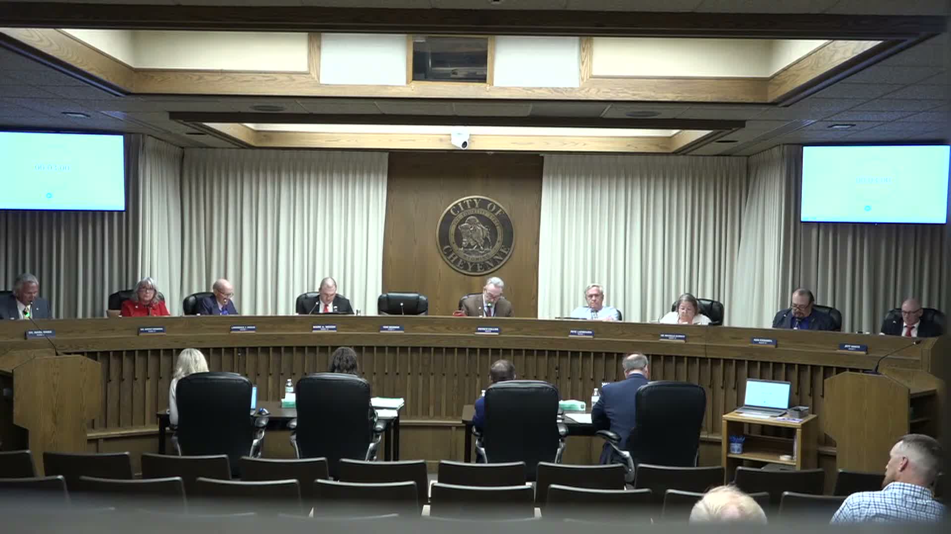 Council approves $25,000 modification for on‑call engineering services; recusal and procurement questions raised