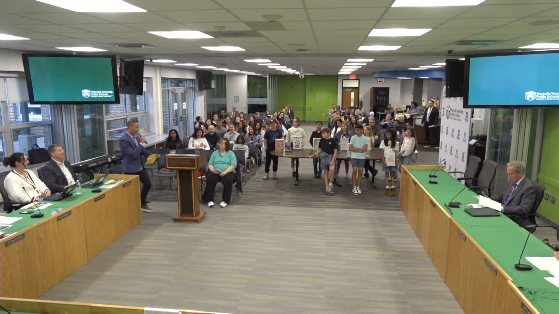 Students showcase projects and choir at Montville board meeting
