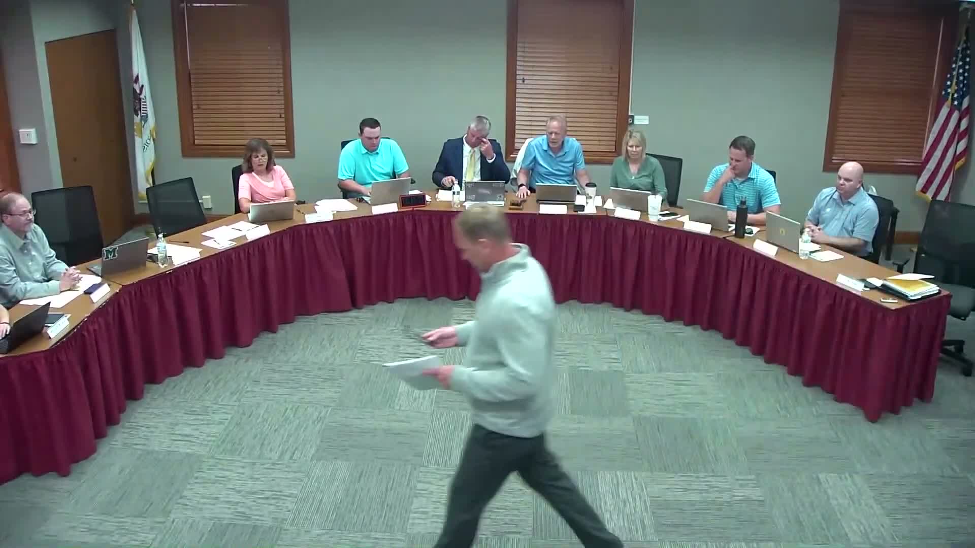Board accepts personnel report; several resignations and retirements noted, one recorded no vote