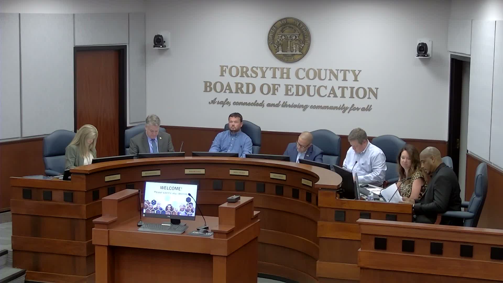 Board approves criminal background-check policy and routine personnel and consent items
