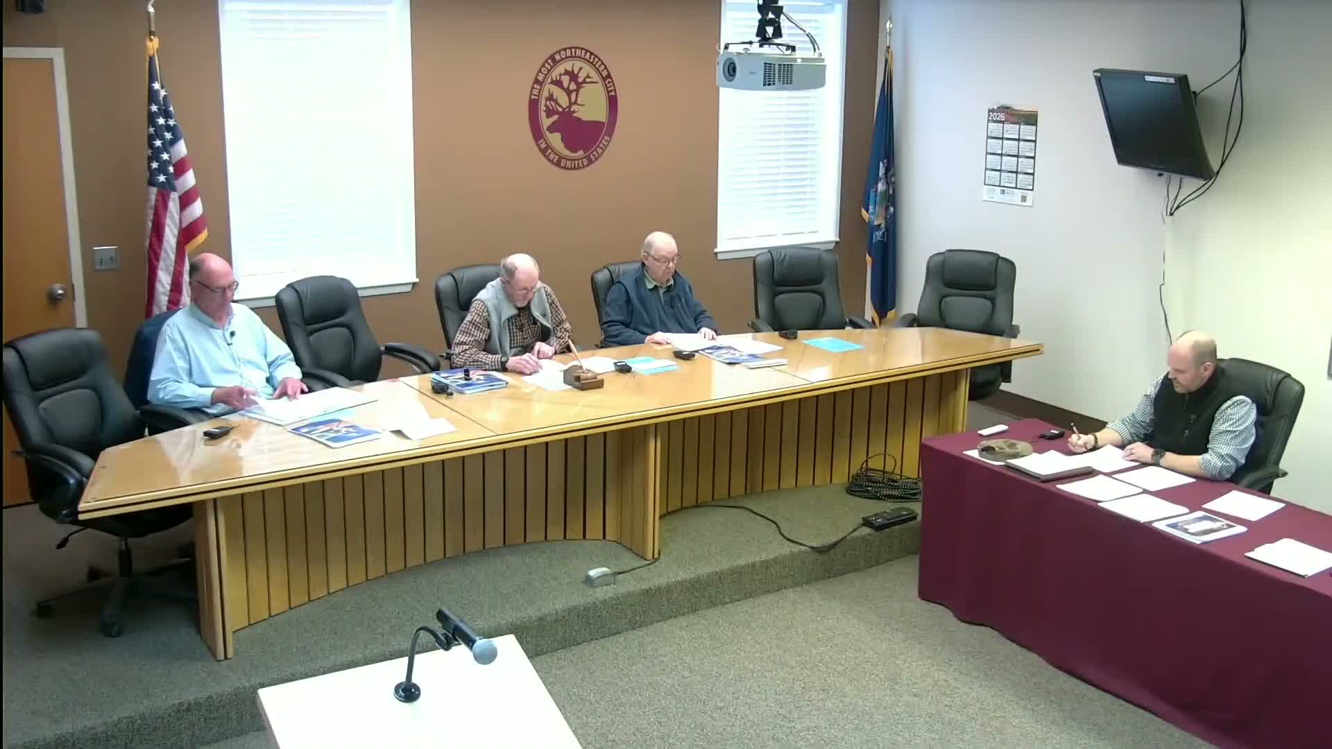 Caribou Utilities District awarded river-crossing contract and gains roughly $1,000,000 in flexible grant funds; board approves minutes, financials and moves to