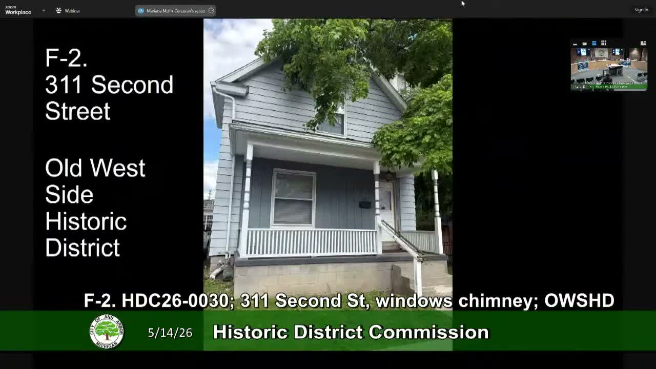 Commission approves window and door replacements at 311 2nd Street but rejects removal of historic chimney