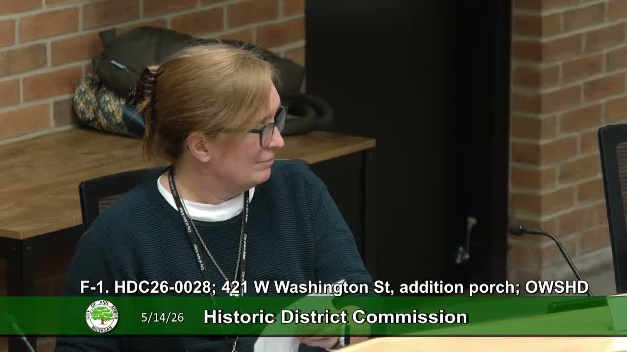 Historic commission postpones decision on porch restoration and visible second‑story addition at 421 West Washington