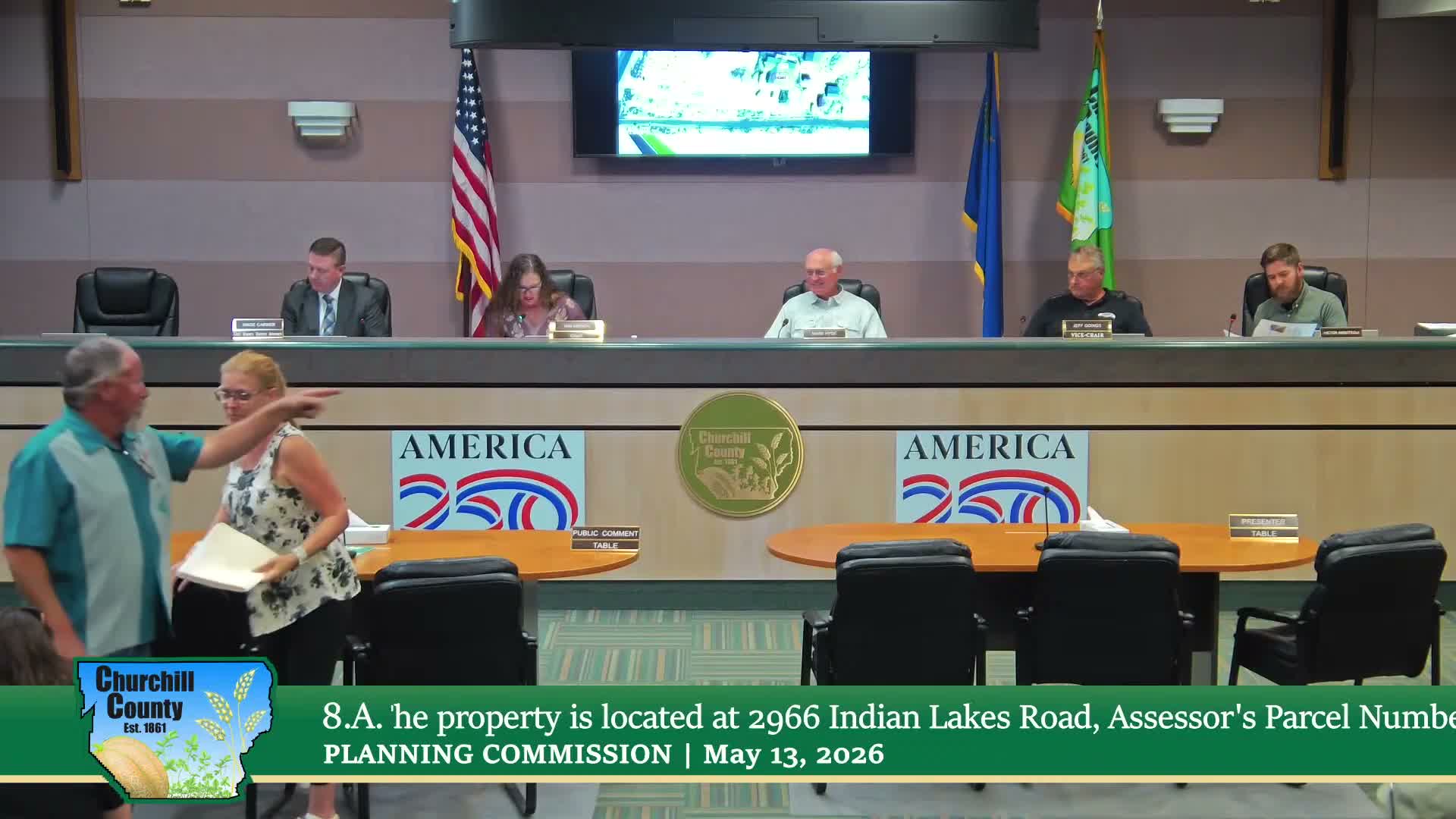 Commission approves variance to allow boundary line adjustment between two nonconforming parcels; one abstention recorded