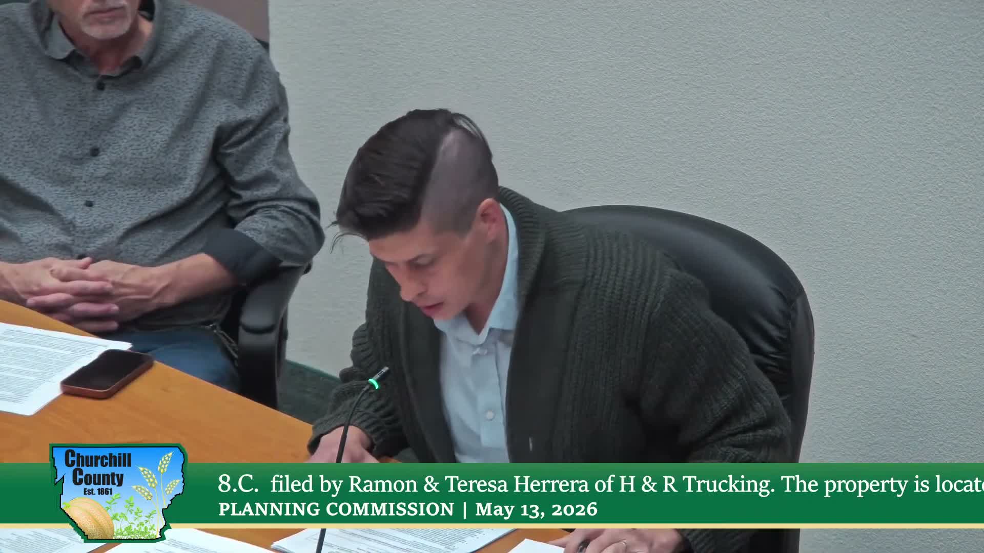 Planning commission approves special‑use permit to legalize fleet parking at Reno Highway site after code‑enforcement referral